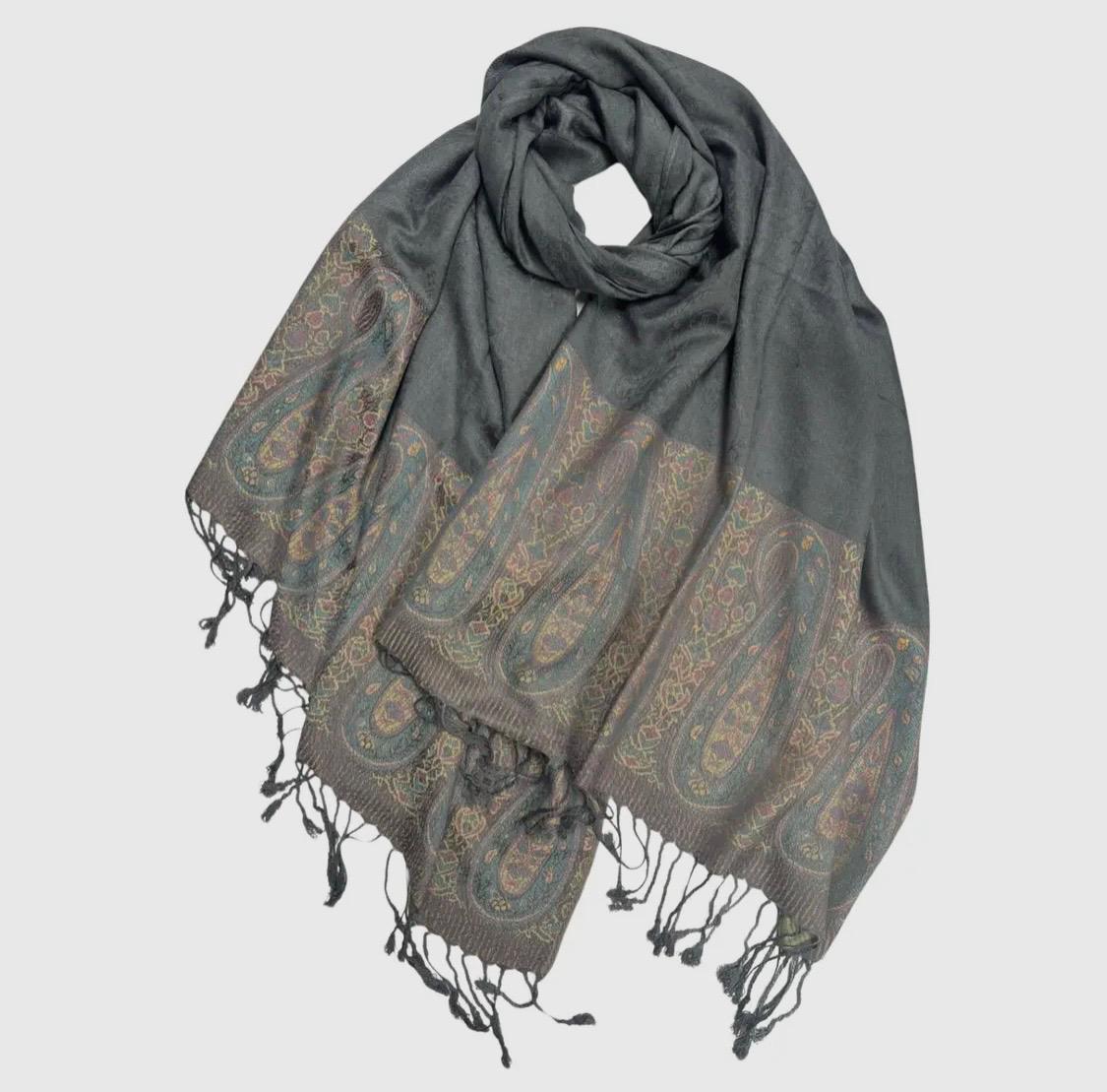 Pashmina/wrap/shawl with a beautiful paisley self print and a paisley border and fringe