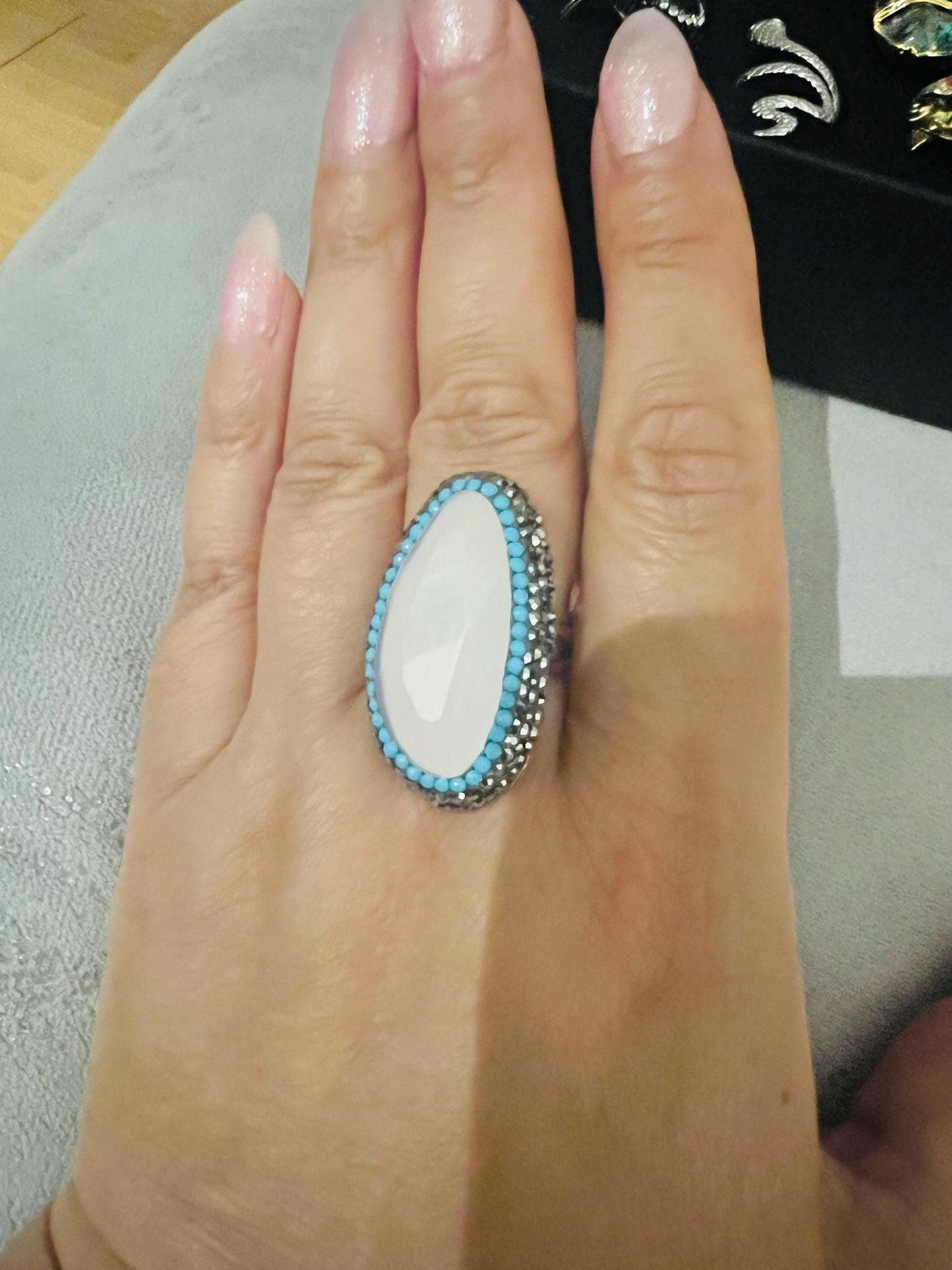 Handmade glass stone with stunning crystal surround, gold plated adjustable ring