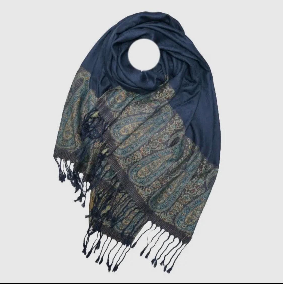 Pashmina/wrap/shawl with a beautiful paisley self print and a paisley border and fringe