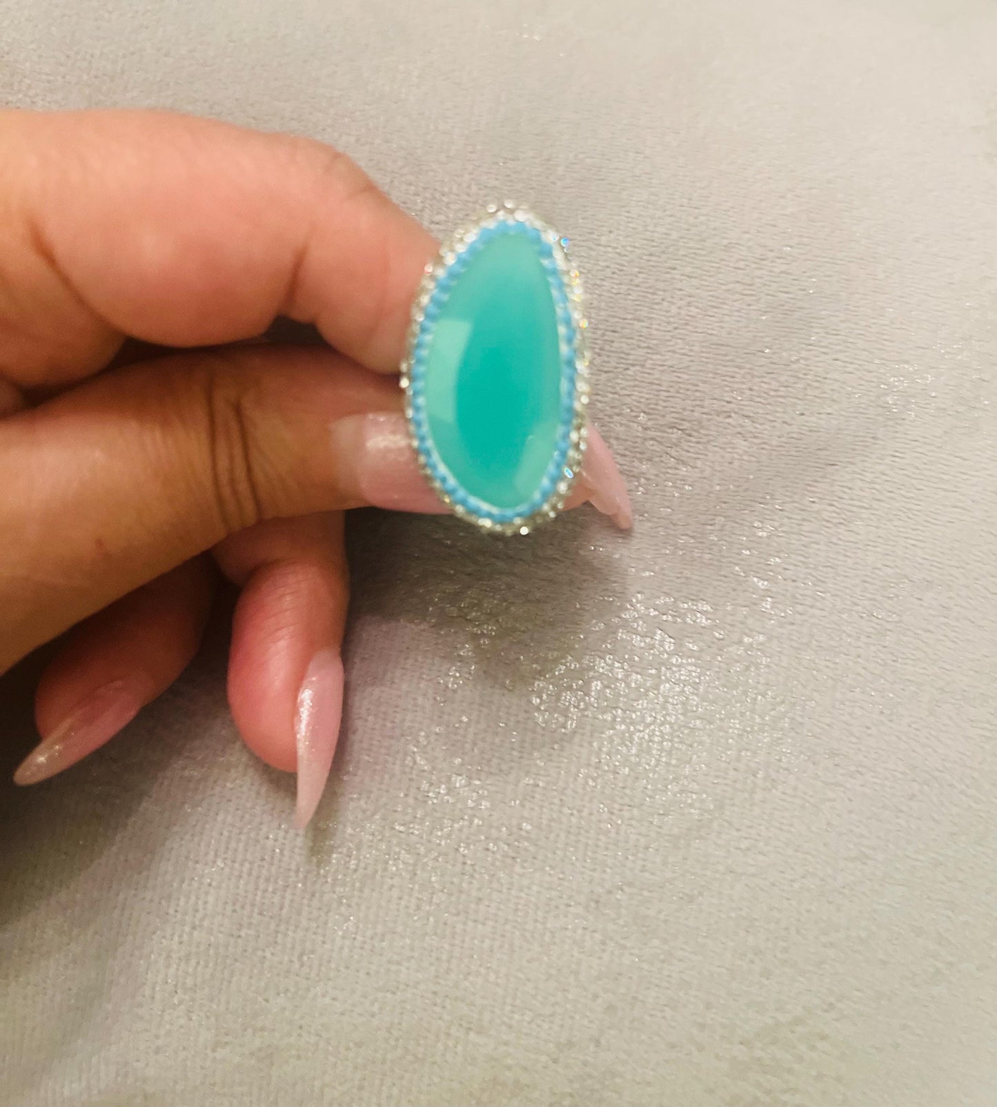 Handmade glass stone with stunning crystal surround, gold plated adjustable ring