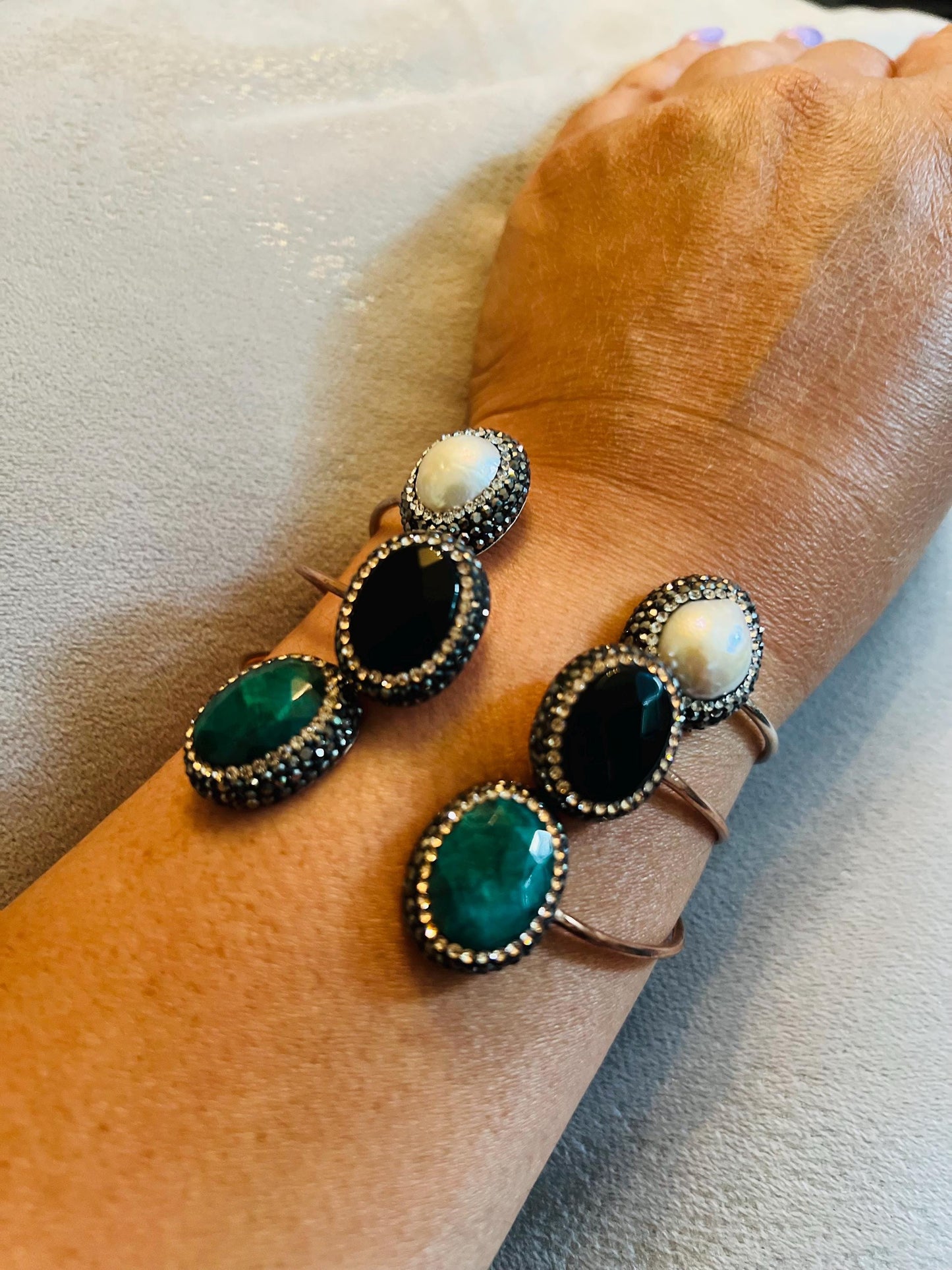 Sterling silver gemstone bracelet with onyx, lab emerald or pearl stone and surrounding rhodium