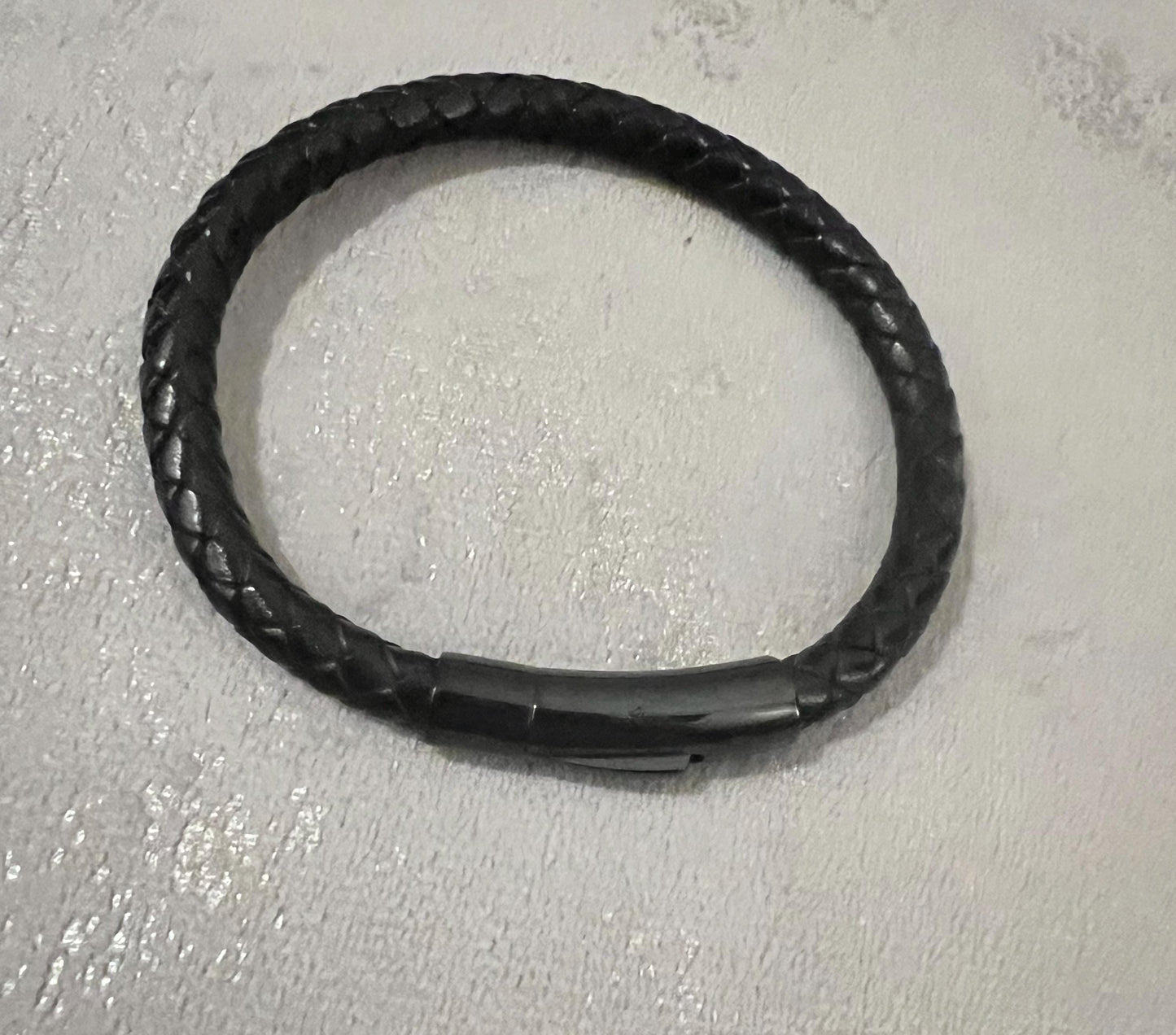 Men’s leather and stainless steel bracelets