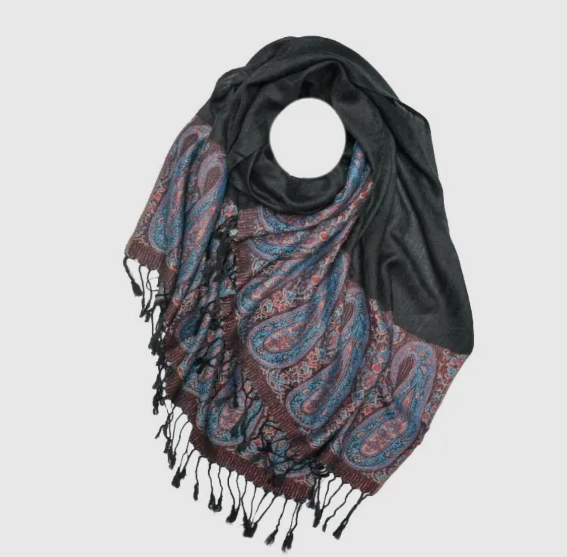 Pashmina/wrap/shawl with a beautiful paisley self print and a paisley border and fringe