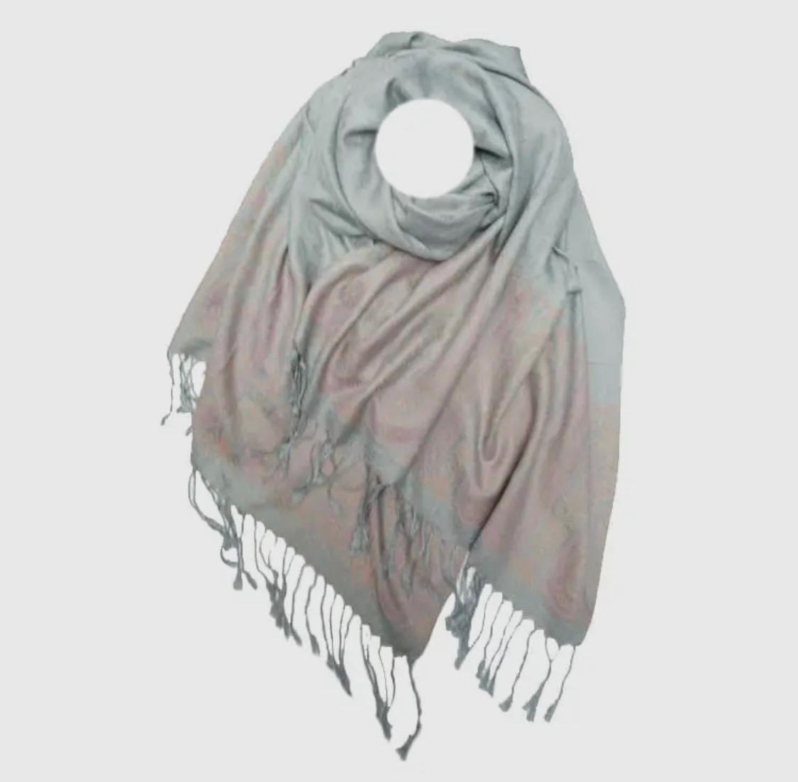 Pashmina/wrap/shawl with a beautiful paisley self print and a paisley border and fringe